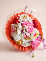 Bouquet di carta cipria e corallo