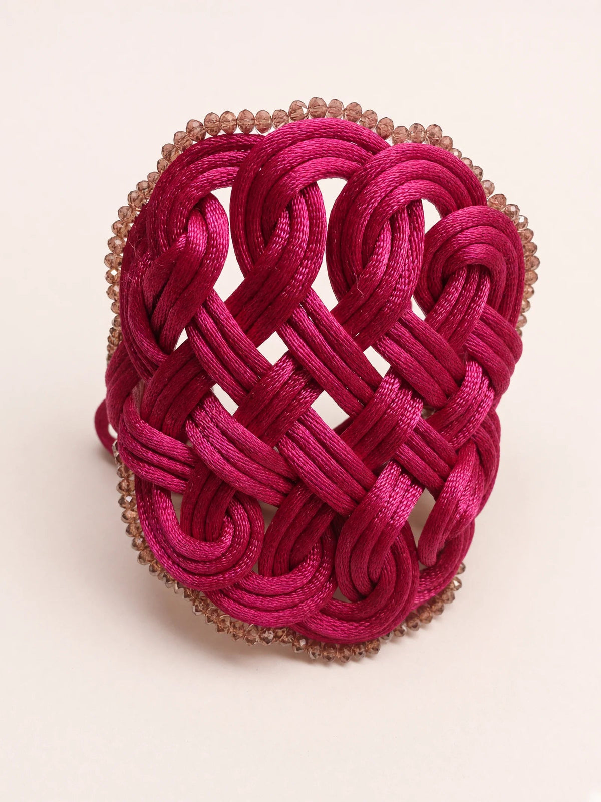 Bracciale intrecciato fucsia — vista prodotto