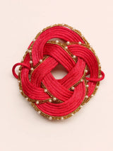 Bracciale con nodo rosso e dettagli perlati — vista prodotto